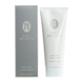 Lotion corporelle Jessica McClintock au karité et macadamia pour hydrater durablement.