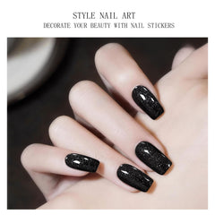 Applicateur en bois inclus pour ajuster les stickers sur les ongles.