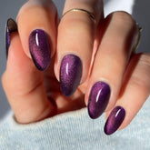 JMEOWIO autocollants gel pour ongles, effet œil de chat violet, design unique et longue tenue.