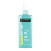 John Frieda spray texturisant au sel marin, bouteille visible et volume léger.
