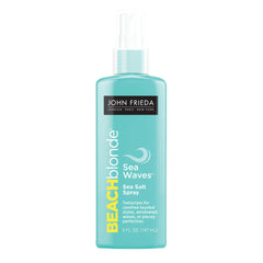 John Frieda spray texturisant au sel marin, bouteille visible et volume léger.