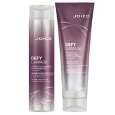 Shampoo Defy Damage de Joico en bouteille, protection couleur et démêlage facilité.