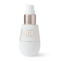 Josie Maran Pure Argan Milk — bouteille; hydratation durable pour peau sèche.