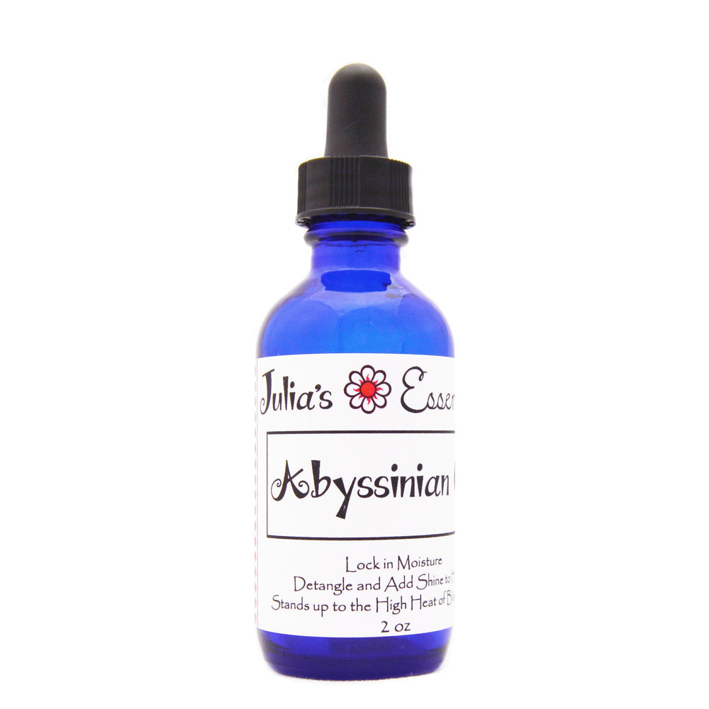 Julia's Essentials huile abyssinienne pure en bouteille, hydratation et douceur pour cheveux.