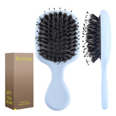 Brosse Jurrissa mini en poils de sanglier, compacte et idéale pour le voyage.