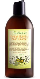 Just Nutritive Rinçage au vinaigre — bouteille prête pour un soin capillaire naturel.
