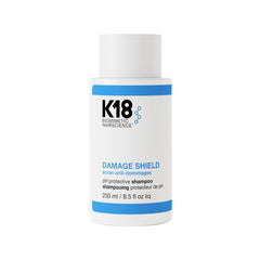 K18 Damage Shield: bouteille ouverte préservant la couleur tout en nettoyant en douceur.