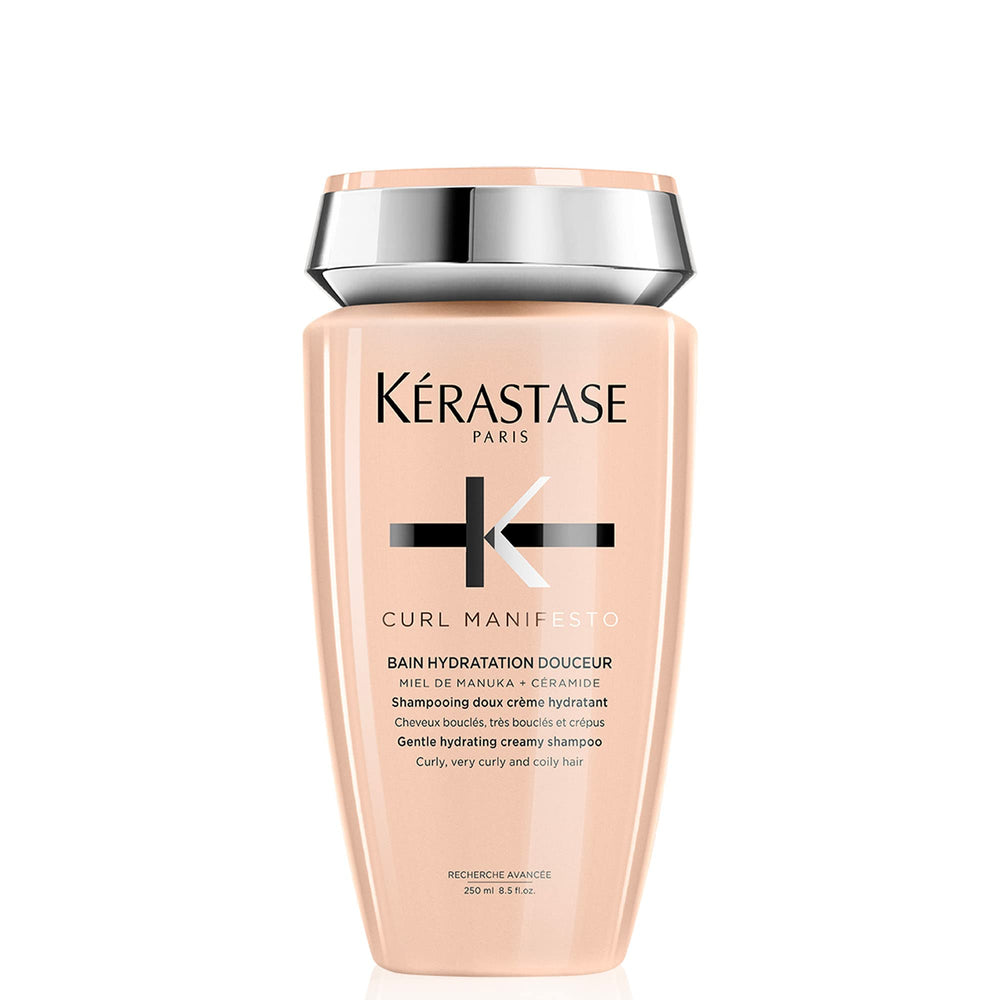 KÉRASTASE Curl Manifesto Shampoing, bouteille élégante pour hydratation des boucles.