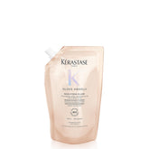 Kérastase Gloss Absolu – bouteille lumineuse pour cheveux brillants et hydratés après chaque lavage.