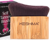 Brosse auto-bronzant KESHIMA pour un teint uniforme visage et corps.
