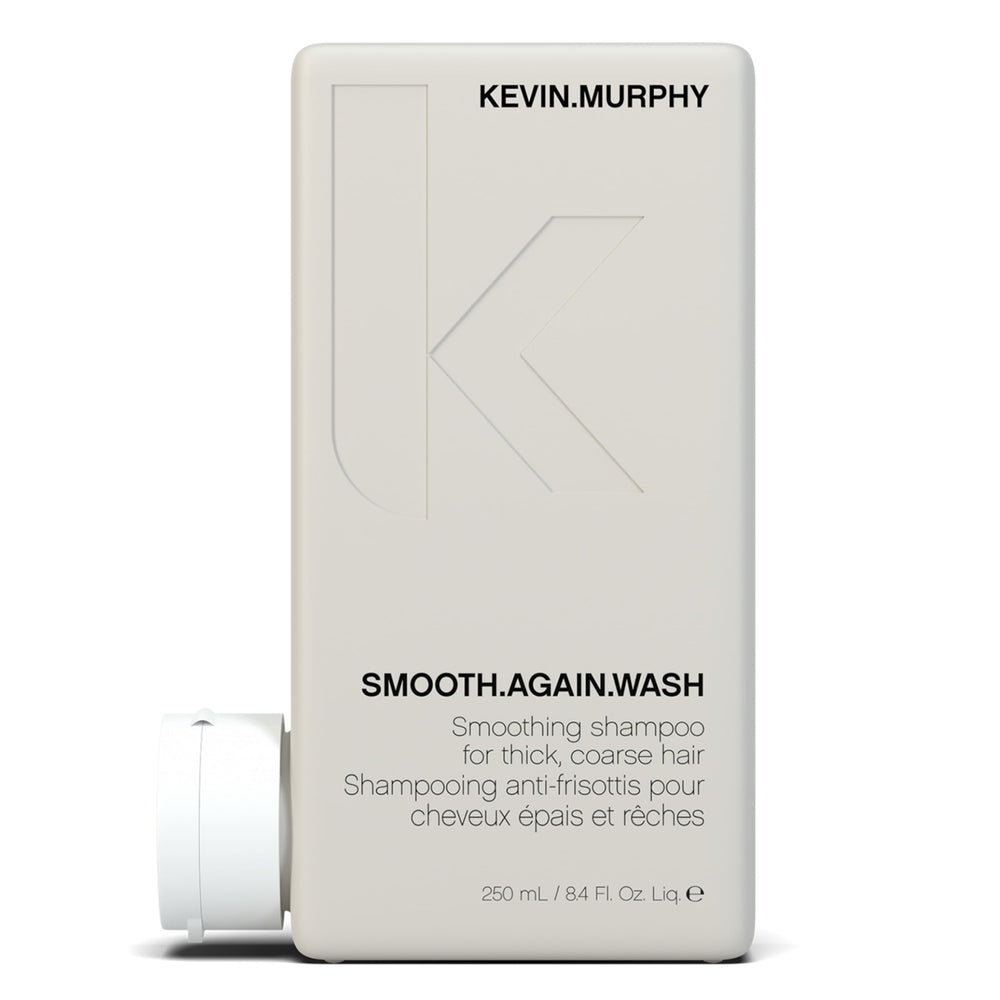 La bouteille KEVIN.MURPHY SMOOTH.AGAIN WASH offre hydratation et douceur quotidiennes.