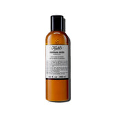 Kiehl's Original Musk – flacon en gros plan et mousse satinée prête à l'emploi.