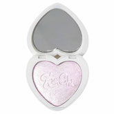 KimChiChic Pearl Gone Wild: poudre éclat visage pour un teint lumineux.