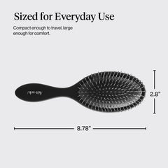Brosse Kitsch poils flexibles démêlant en douceur.