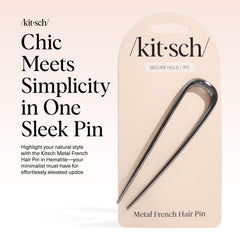 Épingle Kitsch hematite portée dans le sac pour retouches rapides.