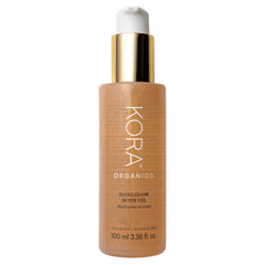 Huile Noni Glow KORA Organics: bouteille prête pour hydratation légère.
