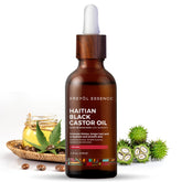 KREYÒL ESSENCE huile noire de ricin haïtienne dans une bouteille en verre pour cheveux plus forts.