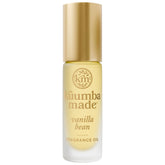 Kuumba Made Huile parfumée vanille roll-on sur bouteille, application fluide et durable.