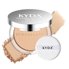 KYDA Poudre minérale SPF35, fini mat léger pour teint homogène.