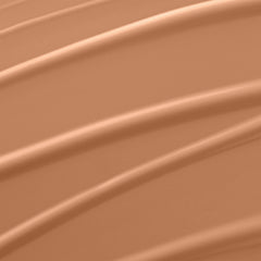 Texture glissante du fond de teint pour une application facile et uniforme.