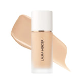 Laura Mercier Real Flawless, couche médiane, couvrance légère à moyenne et naturelle.