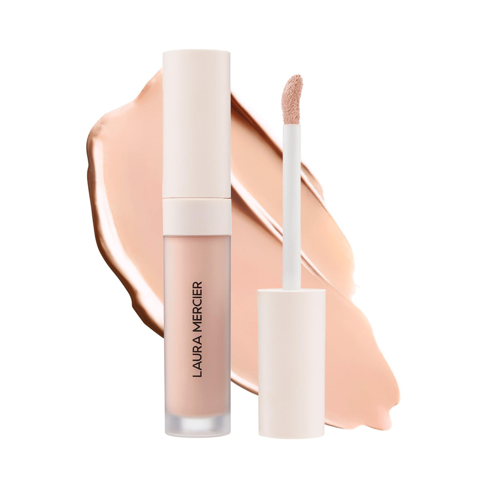 Emballage élégant de Laura Mercier Real Flawless Sérum-Correcteur, présentation premium.