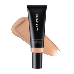 Laura Mercier – bouteille élégante, fini flouté et contrôle des brillances.