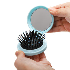 Lawei brosse-cheveux pliable avec miroir violet pour coiffage précis en voyage.