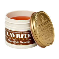 Layrite Superhold Pomade, texture brillante, maîtrise cheveux épais et bouclés.