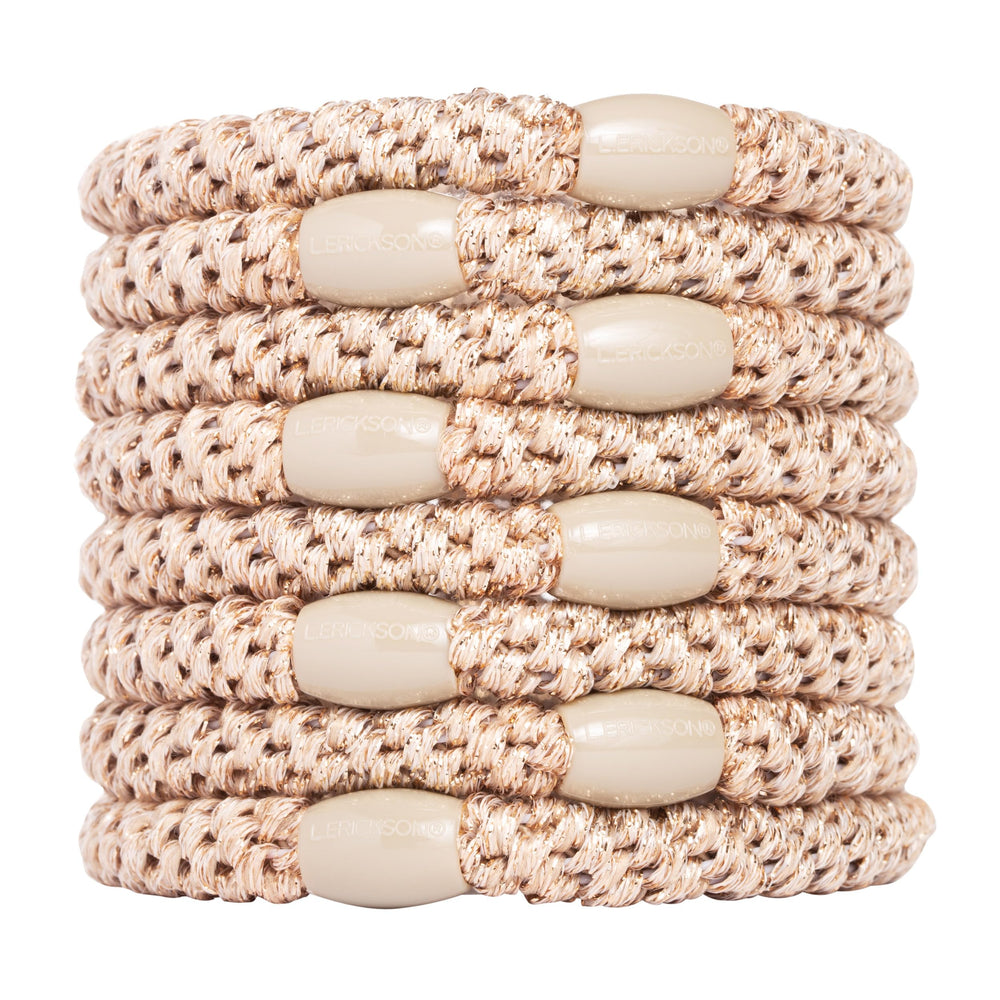 L. Erickson: bandes cheveux dorées beige, fini métallique pour un style discret et durable.