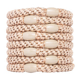 L. Erickson: bandes cheveux dorées beige, fini métallique pour un style discret et durable.