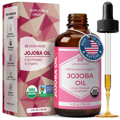 Huile de jojoba Leven Rose dans une bouteille ambrée, hydratation légère et efficace.