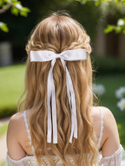 Barrette LFOUVRE noeud ruban longue queue rose, allure élégante au quotidien.