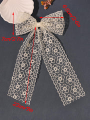LFOUVRE Broche cheveux dentelle beige fleurs, touche féminine subtile.