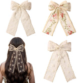 LFOUVRE Noeud dentelle beige à fleurs brodées, idéal pour une coiffure élégante.