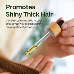 Lia Organics Hair Growth Oil : texture huileuse sur les doigts pour soin enrichissant.