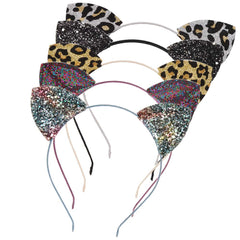 Bandeau Lirila avec oreilles-chat paillettes noir léopard imprimé, allure prête pour costume.