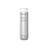 Living Proof – bouteille d’après-shampooing volumisant affichant le volume des cheveux.