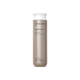 Living Proof No Frizz Conditioner – bouteille élégante qui lutte contre les frisottis durablement.