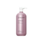 Living Proof Restore Conditioner — la bouteille élégante qui démarre le soin et démêle facilement.