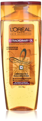 Bouteille L’Oréal Paris huile extraordinaire prête à nourrir les cheveux.