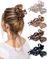 Gros plan sur les pinces Lourny Papillon Noir, maintien fiable pour cheveux fins et épais.