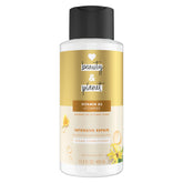 Conditionneur Love Beauty And Planet, flacon huile coco et ylang-ylang pour réparation douce des cheveux.
