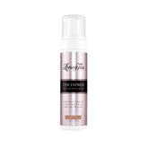 Loving Tan Mousse Express: couleur instantanée et tan naturel, prêt en 2 heures.