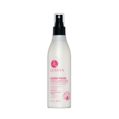 Luseta Glossy Pearl Leave-In Conditioner bottle pour adds shine and moisture.
