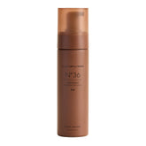Lux Unfiltered N°36: bouteille mousse auto-bronzante pour teint profond et naturel.