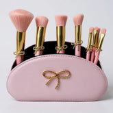 Luxape pinceaux maquillage avec noeud rose pour une application précise et fluide.