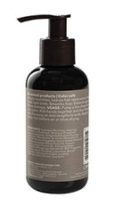 Macadamia Professional Ultra Rich Moisture Oil Treatment – goutte d'huile déposée sur cheveux.
