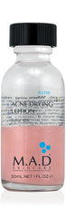 M.A.D Skincare Acne Drying Lotion sur la bouteille, soin ciblé pour les boutons visibles