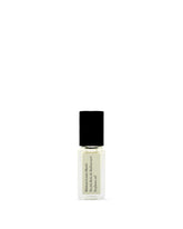 Maison Louis Marie No.04 Bois de Balincourt roll-on bottle for on-the-go fragrance.